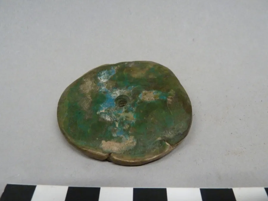 Colgante discoidal